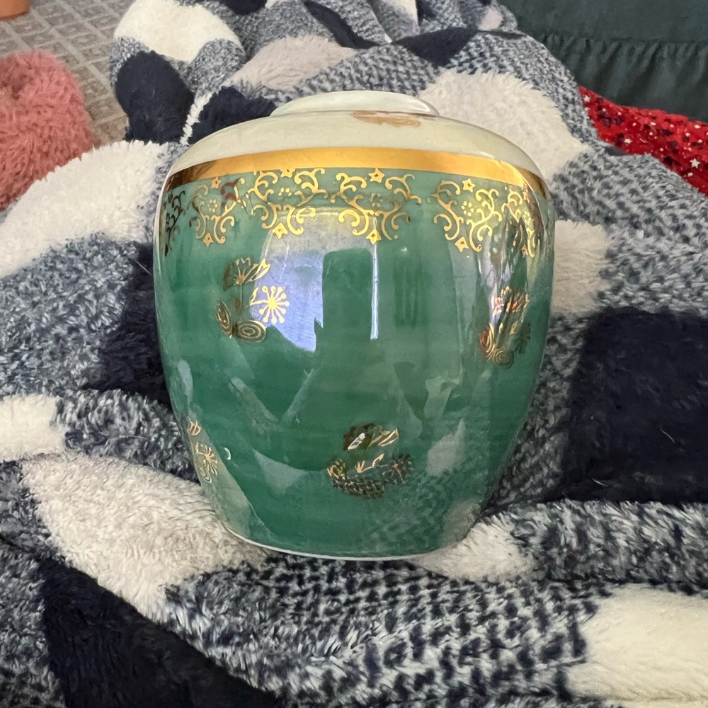 Oriental vase. No chips or cracks. Gold accents.